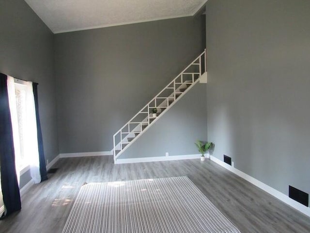 168 Fremont St, Bronson, MI 49028 - unfurnished living room with wood finished floors and baseboards