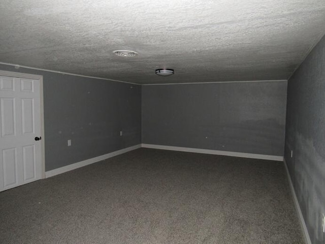 168 Fremont St, Bronson, MI 49028 - spare room featuring a textured ceiling and carpet floors
