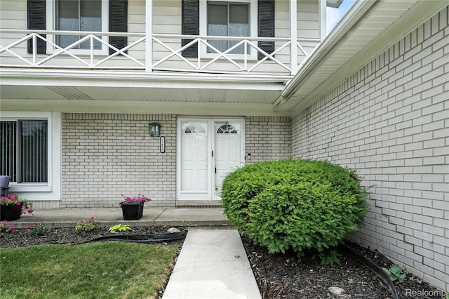 22679 Bell Brook St, Southfield, MI 48034 - property entrance with brick siding and a balcony