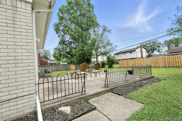 22679 Bell Brook St, Southfield, MI 48034 - fenced backyard with a patio area