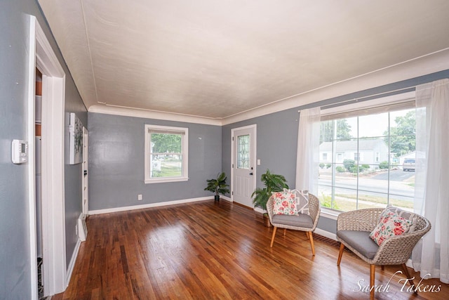 226 Elwell St SW, Grand Rapids, MI 49548 - sitting room featuring baseboards and wood finished floors