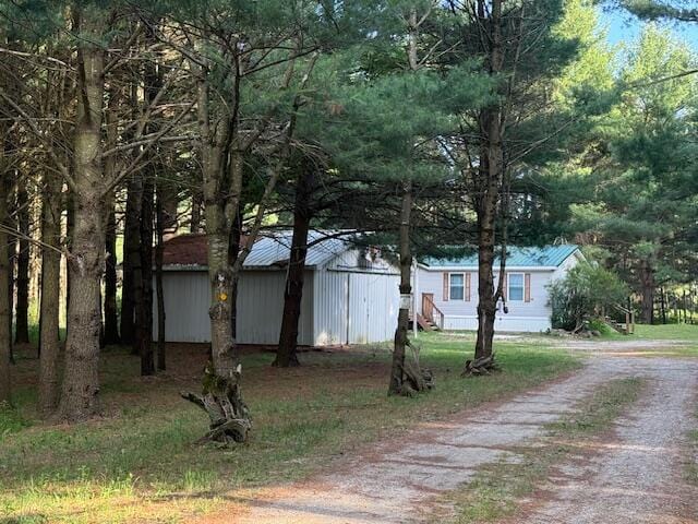 1422 E Monroe St, White Cloud, MI 49349 - view of front of property with driveway