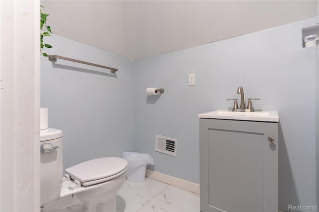 2547 Sheridan St, Detroit, MI 48214 - half bath with vanity and marble finish flooring