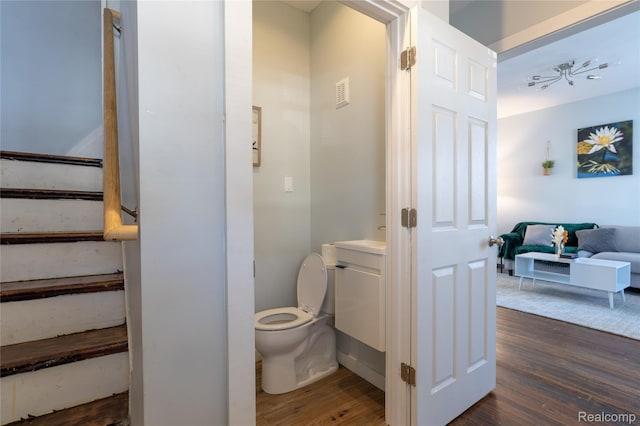 2547 Sheridan St, Detroit, MI 48214 - bathroom featuring wood finished floors and vanity