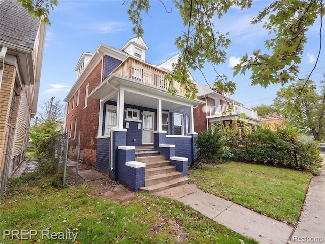 349 Westminster St, Detroit, MI 48202 - view of front of property with a balcony, brick siding, and covered porch