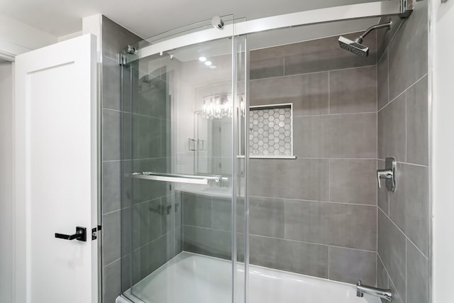 4046 Hillside Trl, New Buffalo, MI 49117 - bathroom with shower / bath combination with glass door