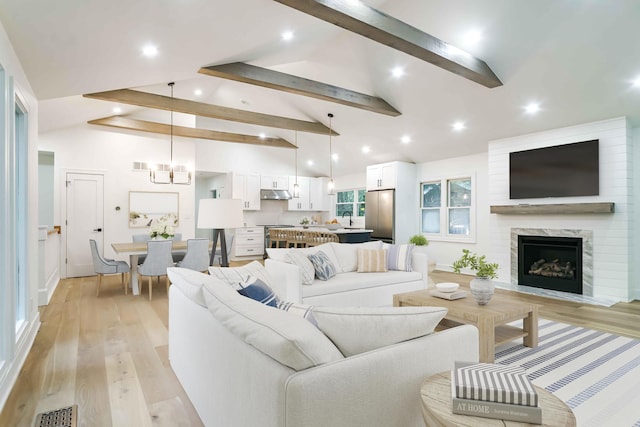 4046 Hillside Trl, New Buffalo, MI 49117 - living area with beamed ceiling, a fireplace, light wood-style floors, recessed lighting, and high vaulted ceiling