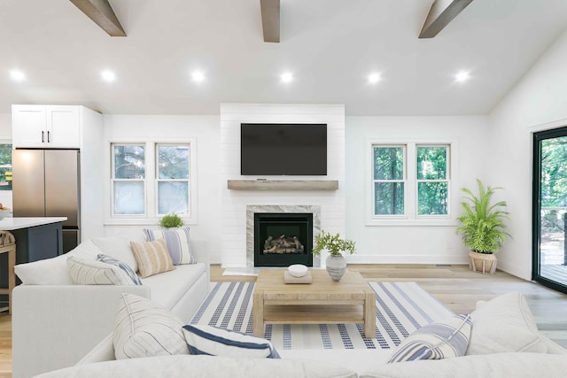 4046 Hillside Trl, New Buffalo, MI 49117 - living room featuring a ceiling fan, light wood-type flooring, recessed lighting, and a fireplace