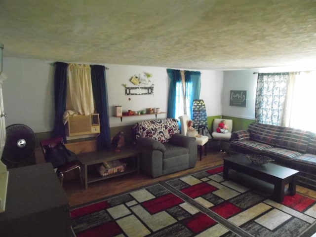 5294 Pinecrest, Prescott, MI 48756 - living room featuring plenty of natural light and a textured ceiling