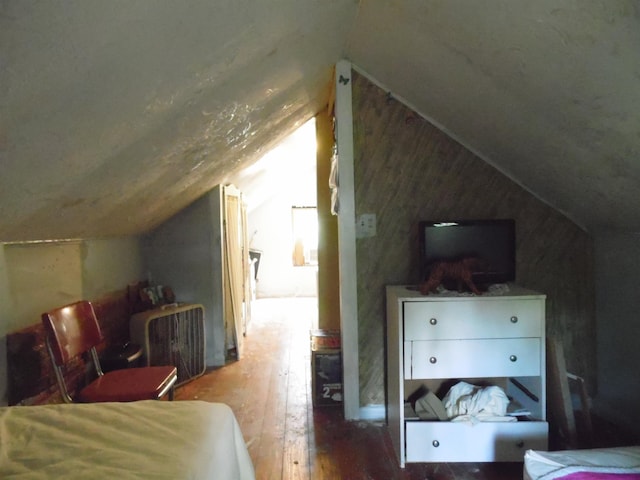 5294 Pinecrest, Prescott, MI 48756 - bedroom featuring hardwood / wood-style flooring and vaulted ceiling