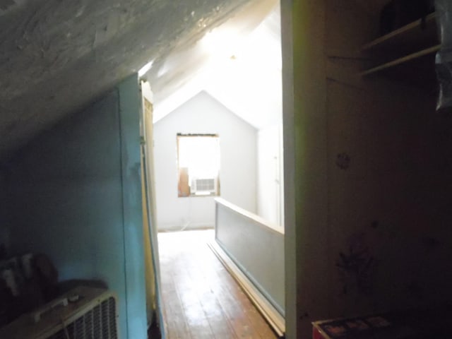 5294 Pinecrest, Prescott, MI 48756 - bonus room featuring lofted ceiling and wood finished floors