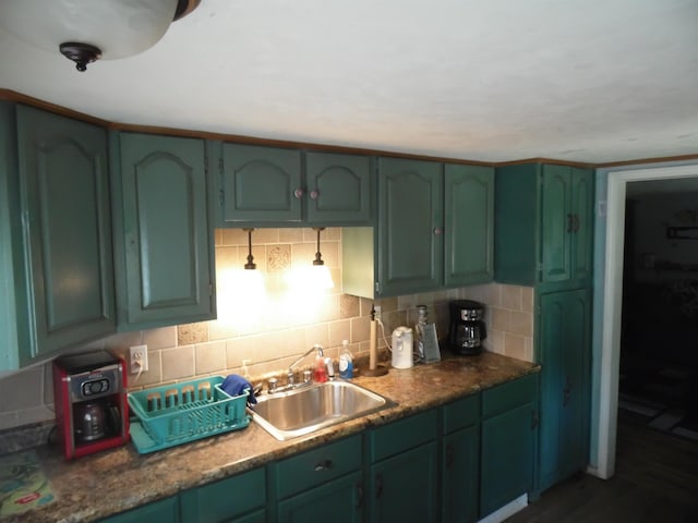 5294 Pinecrest, Prescott, MI 48756 - kitchen with green cabinetry, tasteful backsplash, and dark wood-type flooring