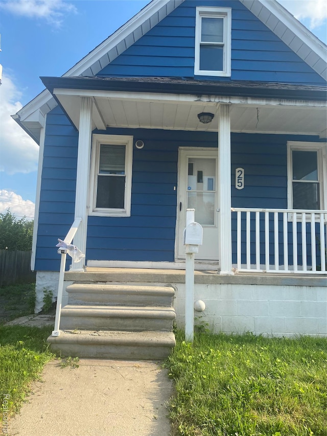25 Marie St, Detroit, MI 48229 - view of front of home featuring covered porch
