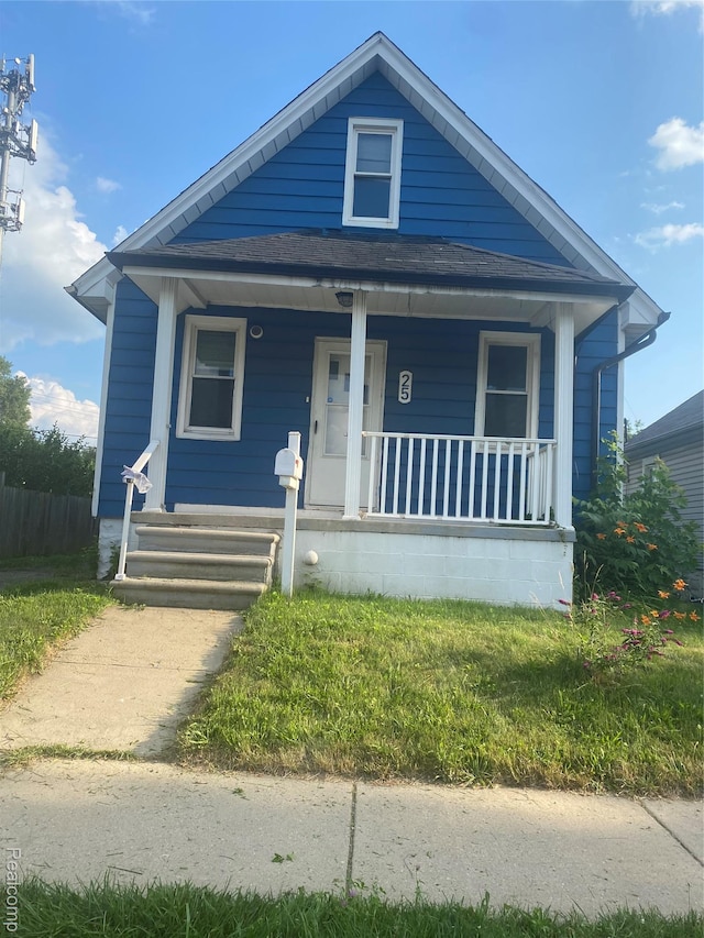 25 Marie St, Detroit, MI 48229 - view of front of house featuring covered porch and a shingled roof