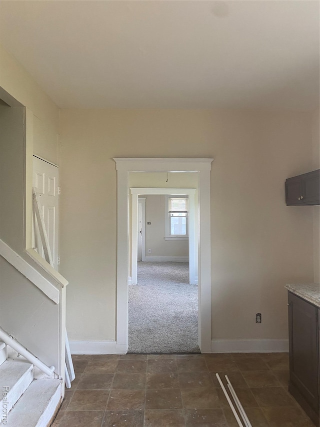 25 Marie St, Detroit, MI 48229 - hall featuring baseboards and dark colored carpet