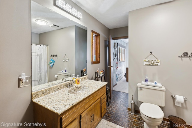 8641 Brettonwood Shores Rd, Rapid City, MI 49676 - full bath with toilet and vanity