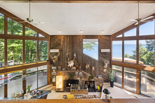8641 Brettonwood Shores Rd, Rapid City, MI 49676 - sunroom featuring lofted ceiling