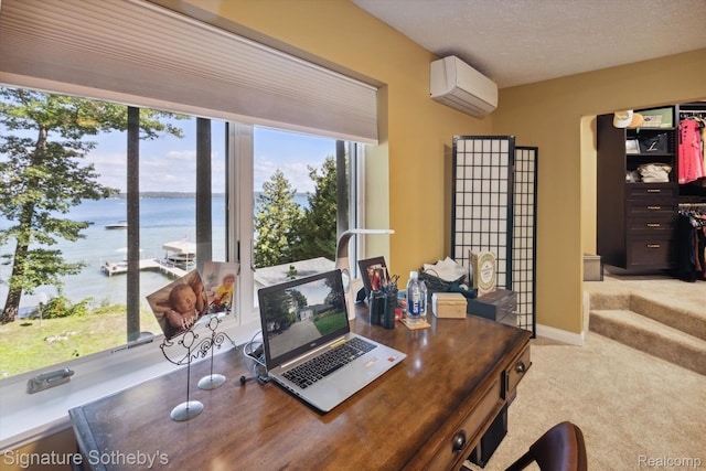 8641 Brettonwood Shores Rd, Rapid City, MI 49676 - office space with a wall mounted AC, carpet flooring, a water view, and plenty of natural light