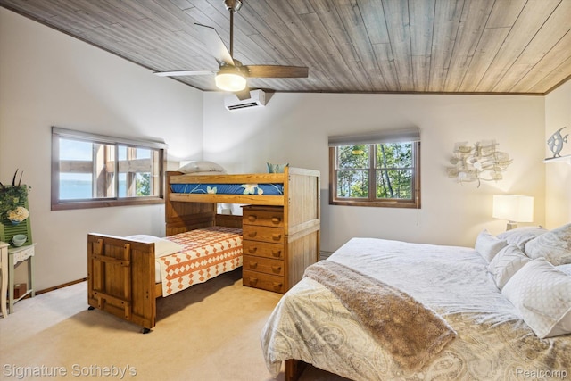 8641 Brettonwood Shores Rd, Rapid City, MI 49676 - carpeted bedroom with vaulted ceiling, wood ceiling, a wall mounted AC, and a ceiling fan