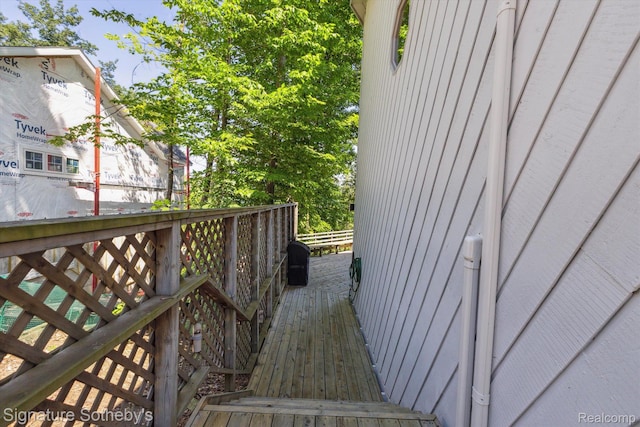 8641 Brettonwood Shores Rd, Rapid City, MI 49676 - view of wooden terrace