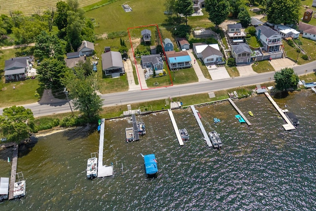 19336 E Chippewa Dr, Chippewa Lake, MI 49320 - aerial view of residential area with property parcel outlined and a large body of water