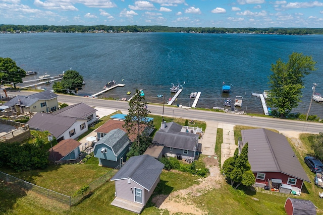 19336 E Chippewa Dr, Chippewa Lake, MI 49320 - aerial perspective of suburban area with a nearby body of water