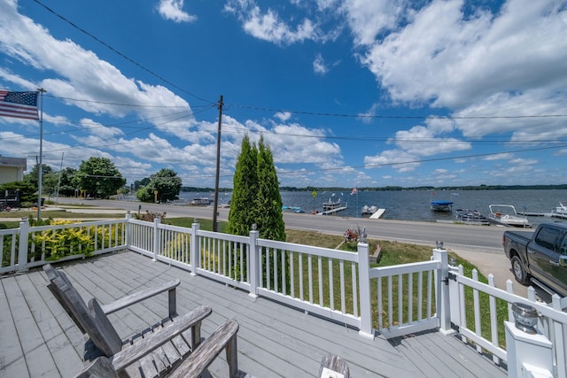 19336 E Chippewa Dr, Chippewa Lake, MI 49320 - wooden deck with a water view