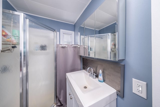 19336 E Chippewa Dr, Chippewa Lake, MI 49320 - bathroom with vanity, a stall shower, and backsplash
