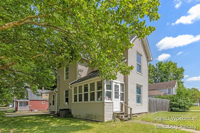 803 S Hanover St, Hastings, MI 49058 - view of property exterior with entry steps and a central AC unit