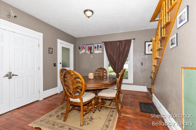 803 S Hanover St, Hastings, MI 49058 - dining space featuring wood-type flooring and stairs