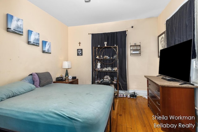 803 S Hanover St, Hastings, MI 49058 - bedroom featuring dark wood-style floors and baseboards