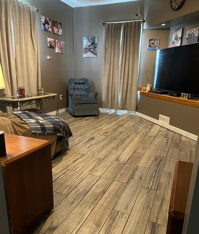 803 S Hanover St, Hastings, MI 49058 - bedroom with wood finished floors and baseboards