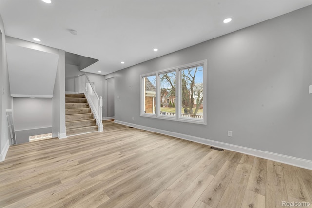 5291 Devonshire Rd, Detroit, MI 48224 - below grade area with light wood finished floors, stairs, and recessed lighting