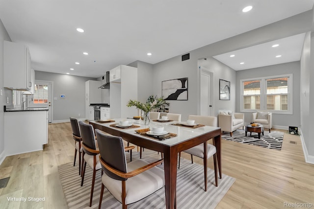 5291 Devonshire Rd, Detroit, MI 48224 - dining area with light wood finished floors and recessed lighting