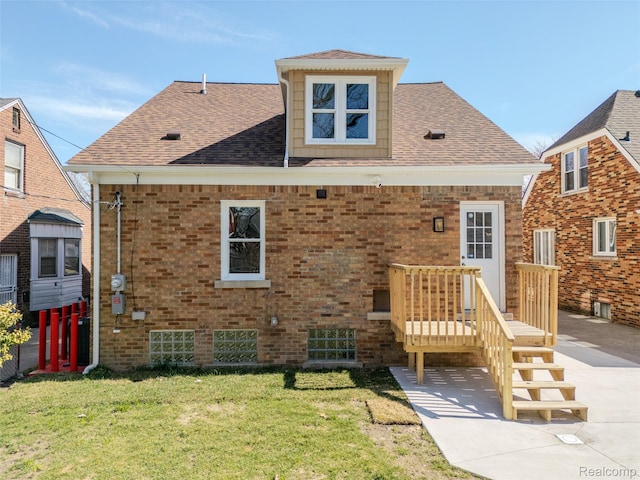 5291 Devonshire Rd, Detroit, MI 48224 - rear view of property with a yard, roof with shingles, and brick siding