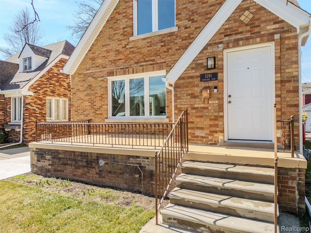 5291 Devonshire Rd, Detroit, MI 48224 - view of front of property with brick siding and roof with shingles