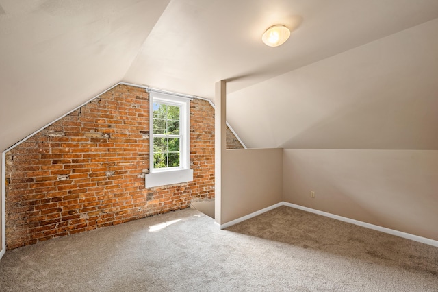 920 Wisconsin Ave, Saint Joseph, MI 49085 - bonus room with vaulted ceiling, carpet floors, and brick wall