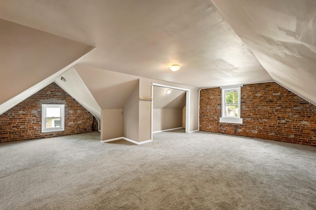 920 Wisconsin Ave, Saint Joseph, MI 49085 - bonus room with brick wall, vaulted ceiling, and carpet floors