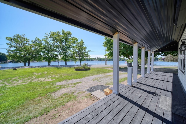 210 W Grove Ave, Michigan Center, MI 49254 - deck with a water view and a lawn