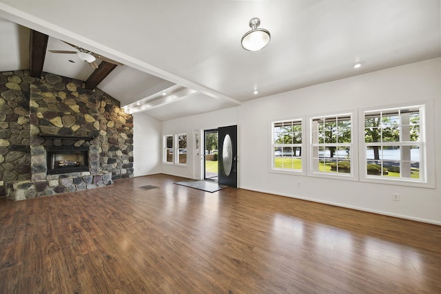 210 W Grove Ave, Michigan Center, MI 49254 - unfurnished living room with wood finished floors and a fireplace