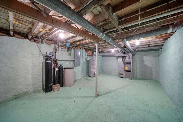 210 W Grove Ave, Michigan Center, MI 49254 - unfinished basement with water heater, a water softener system, heating unit, and electric panel