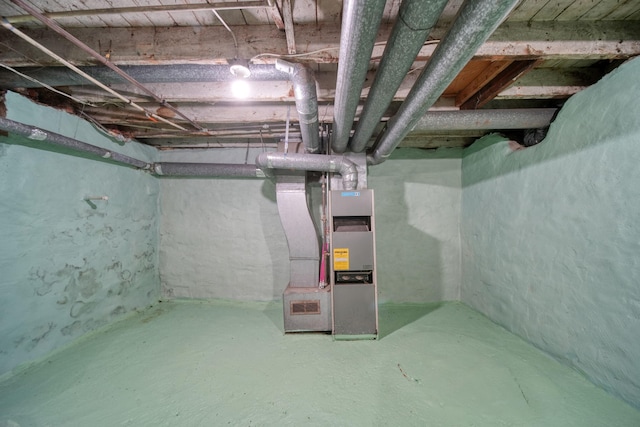 210 W Grove Ave, Michigan Center, MI 49254 - unfinished below grade area featuring heating unit