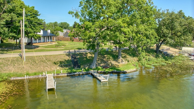 210 W Grove Ave, Michigan Center, MI 49254 - dock featuring a water view
