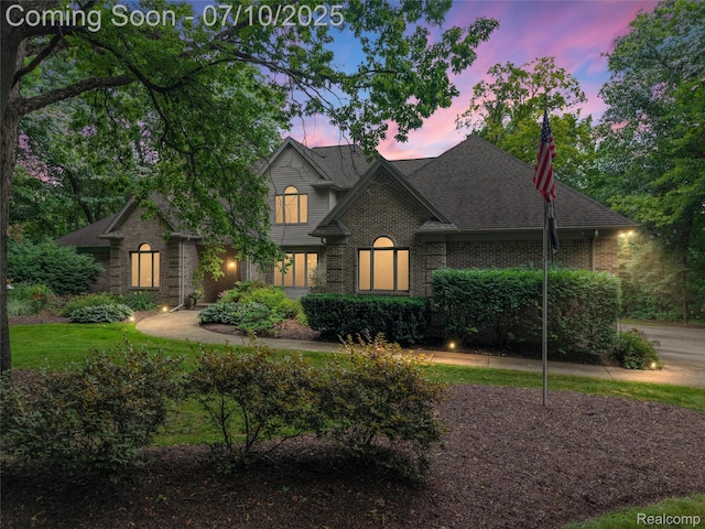 1444 W Clarkston Rd, Lake Orion, MI 48362 - view of front facade featuring brick siding and a shingled roof