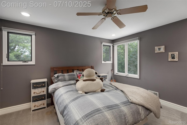 1444 W Clarkston Rd, Lake Orion, MI 48362 - carpeted bedroom with multiple windows, recessed lighting, and ceiling fan