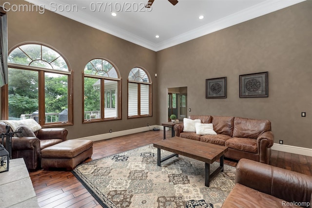 1444 W Clarkston Rd, Lake Orion, MI 48362 - living room featuring ornamental molding, hardwood / wood-style floors, ceiling fan, recessed lighting, and a towering ceiling