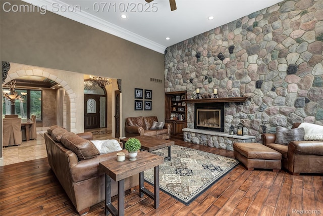1444 W Clarkston Rd, Lake Orion, MI 48362 - living area with arched walkways, crown molding, ceiling fan, hardwood / wood-style flooring, and recessed lighting