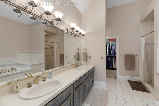 1444 W Clarkston Rd, Lake Orion, MI 48362 - full bath featuring a chandelier, tiled shower, tile patterned flooring, double vanity, and a bathtub