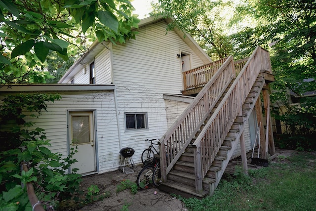 57 S 3rd St, Niles, MI 49120 - rear view of house with stairway and a wooden deck