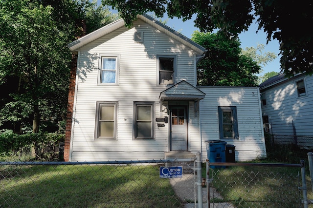 57 S 3rd St, Niles, MI 49120 - traditional home with a fenced front yard and a gate